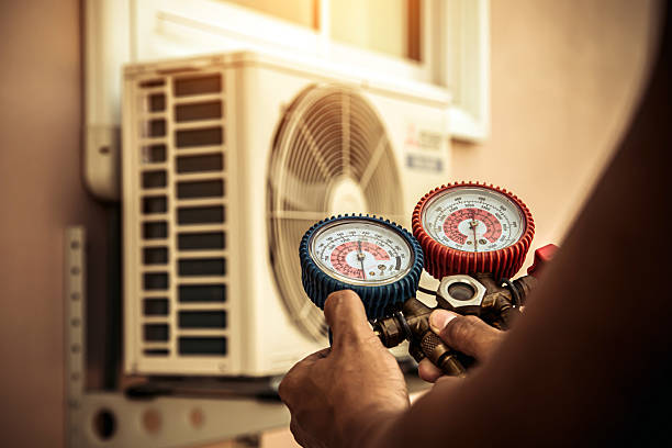 Professional Air Conditioning Service technician working in Baird, TX